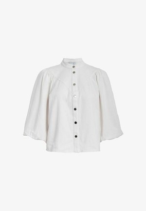 Camicia bianca con colletto alto, maniche a sbuffo e dettagli in nero sui bottoni lungo la parte frontale. Realizzata in un tessuto leggero.