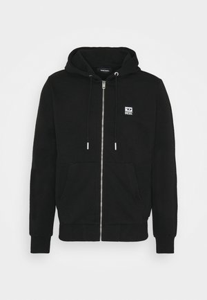 Sweat à capuche noir à fermeture éclair intégrale, avec poches avant, capuche réglable par cordon, et petit logo Diesel blanc sur le côté gauche de la poitrine.