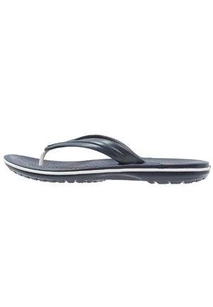 Navy blauwe flip-flop sandaal met een gestructureerd oppervlak, witte zool en dunne banden. Beschikt over een gevormde voetbed voor comfort en grip.