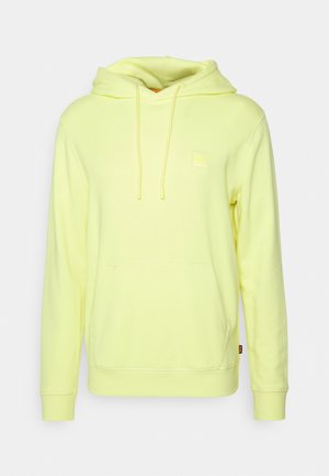 Světlounce žlutá mikina s kapucí, přední kapsou na břiše ve tvaru klokana, šňůrkami a malým logem značky na hrudi a bočním švu.