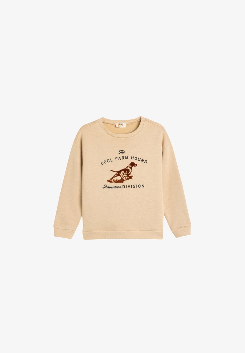 Sudadera de algodón beige con cuello redondo, mangas largas y puños acanalados. Presenta texto gráfico marrón e ilustración de un perro.