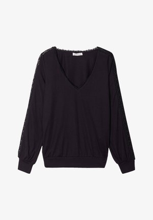 Top nero a maniche lunghe con scollatura a V profonda, dettagli in pizzo sulle spalle e sui polsini, tessuto morbido e vestibilità rilassata all'orlo.