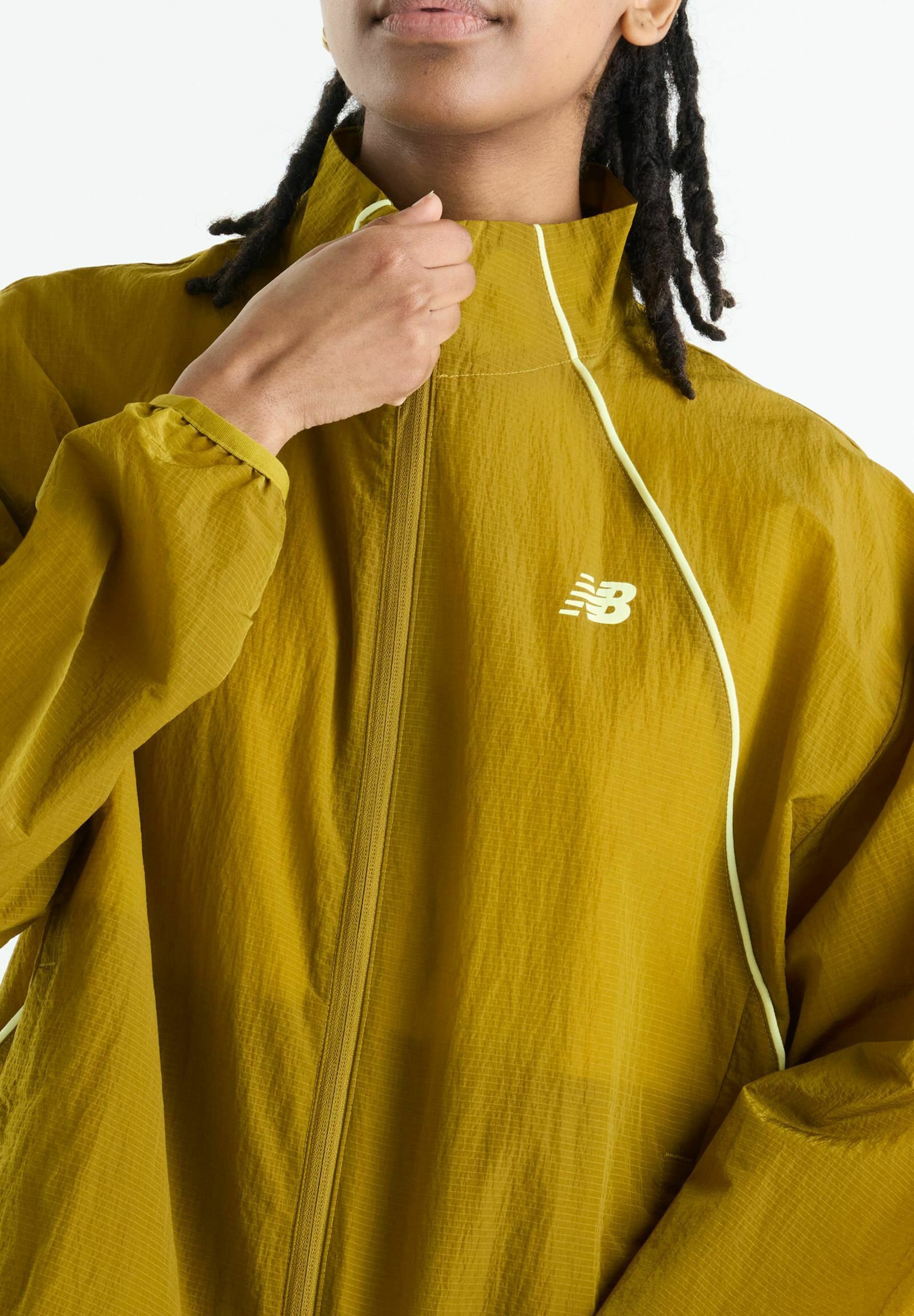 New Balance SPORT LEGACY JACKET - Light jacket - mustard yellow