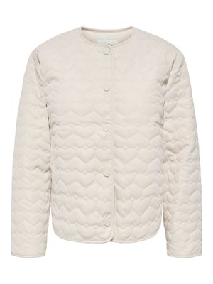 Veste matelassée beige avec surpiqûres en forme de cœur, col rond, manches longues et fermeture à boutons pression devant.