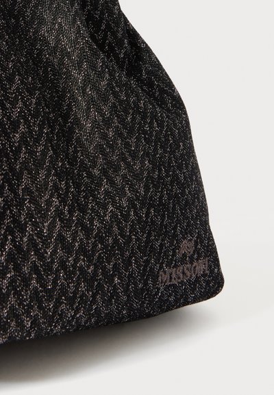 Black herringbone textured bag made of woven material with a subtle sheen and a logo tag in dark gray at the bottom right.