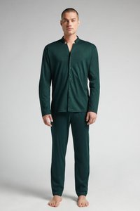 Dark green, long-sleeve button-up shirt paired with matching pants. Soft, smooth fabric, relaxed fit, minimalistic design with a collarless neckline.