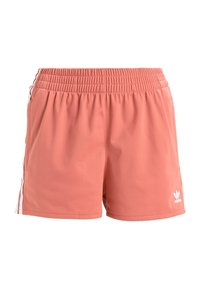 Meruňkové šortky z lehké tkaniny, s elastickým pasem, bočními kapsami a bílými pruhy po stranách. Logo na přední straně.