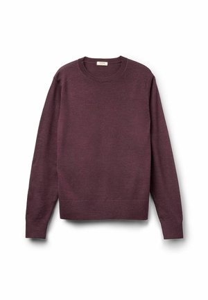 Maglione bordeaux con collo rotondo, maniche lunghe, polsini e orlo a costine. Realizzato in un tessuto a maglia testurizzata.