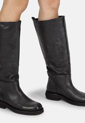 Black leather knee-high boots with a smooth texture, rounded toe, low stacked heel, and slouchy design. Simple, sleek appearance.