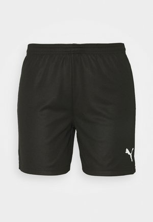 Schwarze Sportshorts mit elastischem Bund und weißem Puma-Logo am unteren linken Bein vor einfarbigem Hintergrund.