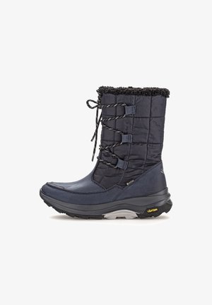 Marine waterdichte winterlaars met een geborduurd textielschaft en een nepbontkraag. Voorzien van verstelbare veters en een getextureerde rubberen zool. Vibram-branding.