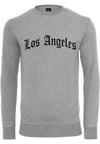 Szürke pulóver, amelyen a "Los Angeles" felirat fekete, gótikus betűtípussal áll. A pulóver klasszikus kerek nyakkivágással és bordázott mandzsettákkal, valamint aljjal rendelkezik.