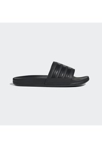 Black slide sandal made of synthetic material, featuring a textured striped strap, flat sole, and open toe design.