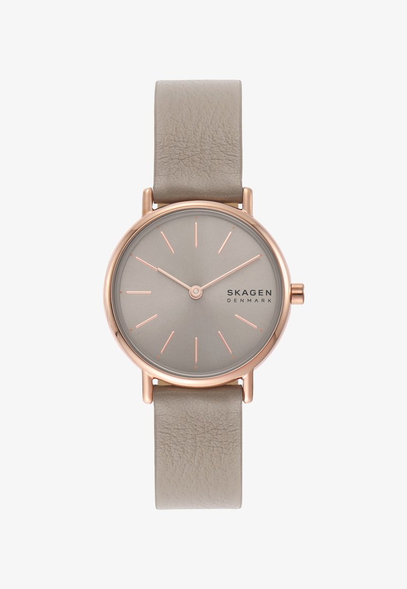 Jasnoszary skórzany zegarek na pasku z okrągłą szarym cyferblatem, różowo-złotymi akcentami, cienkimi znacznikami godzin oraz minimalistycznym designem.