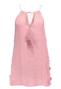 Robe rose sans manches avec fines bretelles, un décolleté en V et deux liens à pompons suspendus au centre devant.
