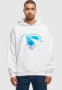White hoodie featuring blue geometric diamond graphic with "TAKE ME HOME" text, front pocket, and loose fit design. Cotton blend material.
