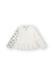 Camisa blanca de manga larga con dobladillo rizado, que presenta una manga con patrón gris y un detalle de lazo en la parte posterior. Tela suave, diseño casual.