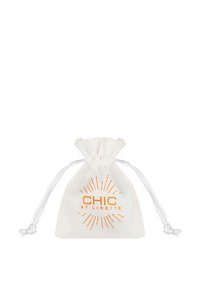 White fabric drawstring bag featuring the text "CHIC by Lirette" in orange, with a sunburst motif surrounding the text. Smooth texture.