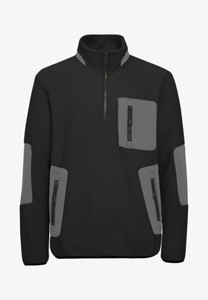 Musta fliistepullover, millel on pooltõmbluku kaelus, hallid aktsendid ja mitmed tõmblukuga taskud ees ja külgedel. Pehme tekstuur.