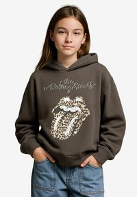Brauner Hoodie mit Leopardenmuster und Rolling Stones-Logo. Weicher Stoff, Kapuze mit Zugband und gerippte Bündchen. Lässige Passform mit Fronttasche.