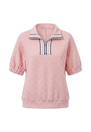 Polo rose texturé à manches courtes avec poignets élastiques et col zippé à moitié rayé.