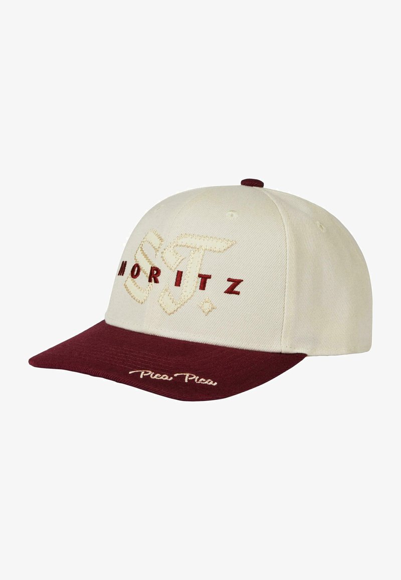 Gorra beige con visera burdeos, que presenta bordados en dorado de las marcas "Moritz" y "Pica Pica" en el frente. Diseño estructurado de seis paneles.