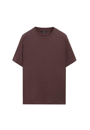 T-shirt uni à manches courtes et col rond, de couleur marron foncé, présenté à plat sans motifs ni logos visibles sur le devant.