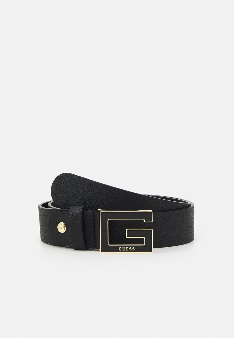 Ceinture en cuir noir texturé avec une grande boucle dorée "G" et un petit clou rond doré avec logo embossé sur la sangle.