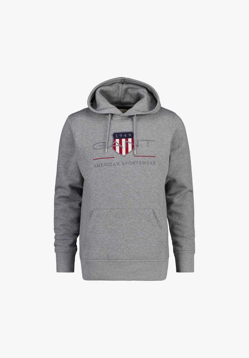 Gray hoodie with a kangaroo pocket, drawstring hood, and a logo featuring a shield with red and blue stripes and text. Cotton blend material.