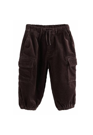 Mørkebrune kordbukser med elastisk talje, snor, sidelommer og elastiske manchetter ved anklerne.