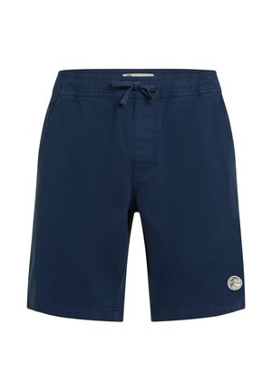 Tumesinised ujumispüksid, valmistatud kerge kaaluga materjalist, millel on elastne vöökoht nööriga ja väike logomärk.