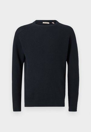 Maglione lavorato a maglia blu navy scuro con scollatura tonda e maniche lunghe, esposto su sfondo bianco semplice.