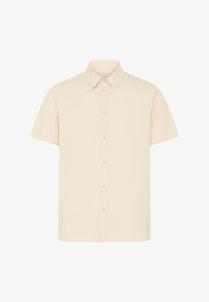 Chemise à manches courtes boutonnée de couleur beige clair. Fabriquée en tissu lisse avec un col classique et une ourlet droit. Six boutons sur le devant.