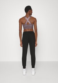 DKNY TWO TONE LOGO DRAWCORD JOGGER - Jogginghose - black