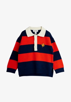 Pullover lavorato a maglia con righe blu navy e arancioni, colletto crema, tre bottoni e un piccolo dettaglio di trifoglio ricamato in oro sul petto.