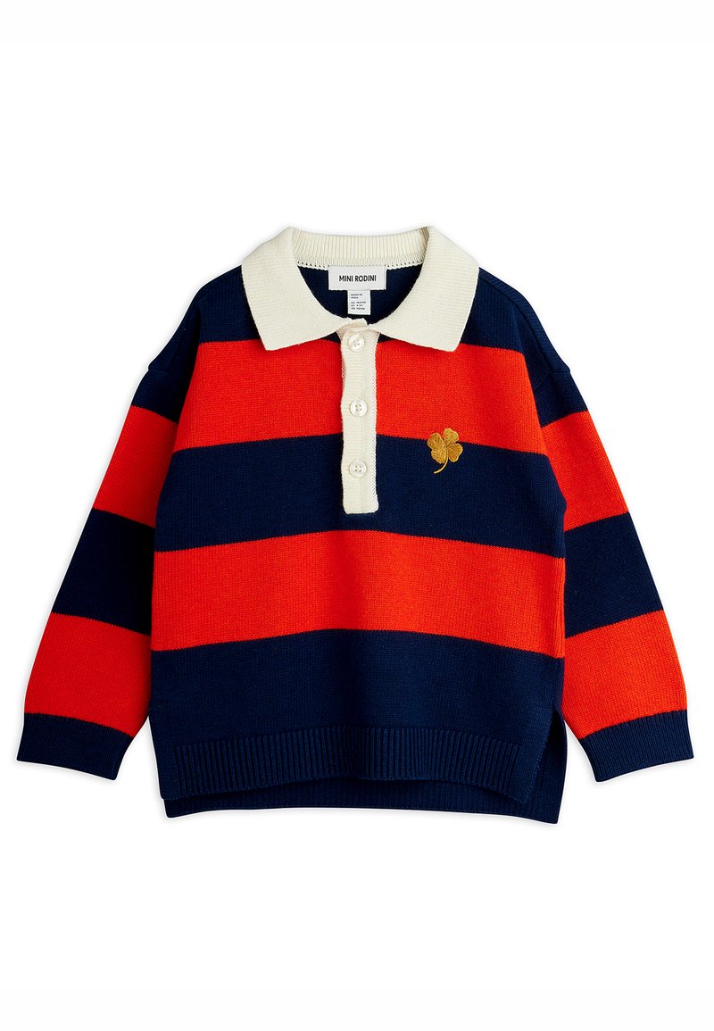 Strikket genser med marineblå og oransje striper, kremfarget krage, tre knapper og en liten brodert gullkløverdetalj på brystet.