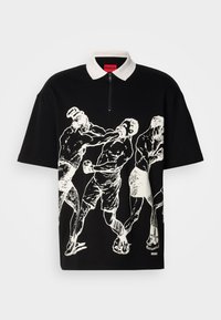 Black short-sleeve polo shirt with white collar and zipper, featuring white graphic of three boxers fighting on the front.