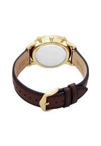 Montre en acier inoxydable doré avec un bracelet en cuir marron foncé, dotée de quincaillerie en métal et d'un dos lisse et réfléchissant.