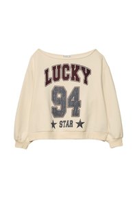 Krémový skrátený sweatshirt s širokým výstrihom. Obsahuje nápis "LUCKY 94" v burgundskej a tmavošedej farbe s hviezdičkovými akcentmi na jemnom, hladkom materiáli.