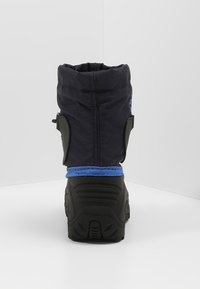 Black and blue snow boot with a textured rubber sole, padded collar, adjustable side strap, and synthetic upper material.