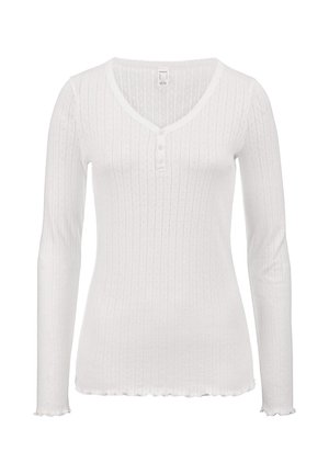 White long-sleeve ribbed knit top with a V-neck, three small buttons, and scalloped edges on the sleeves and hem.