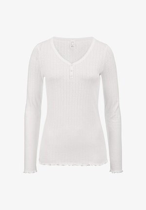 White long-sleeve ribbed knit top with a V-neck, three small buttons, and scalloped edges on the sleeves and hem.