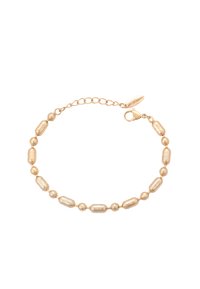 Guldtonad armband med olika texturerade ovala och runda pärlor, säkrad med en spänne och justerbar kedja för storleksanpassning.