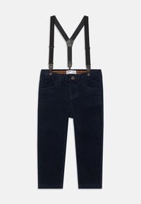 Navy corduroy trousers with adjustable black suspenders, front pockets, button closure, and orange interior lining.