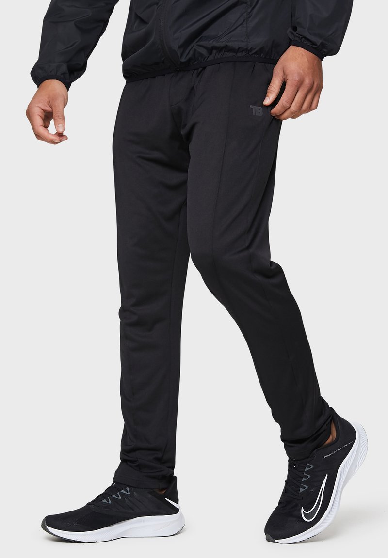 Threadbare Spodnie treningowe/czarny Zalando.pl