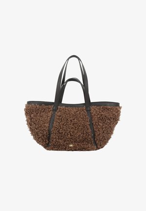 Brown textured tote bag with curly fur-like material on the body and smooth black leather straps; features a gold accent logo.