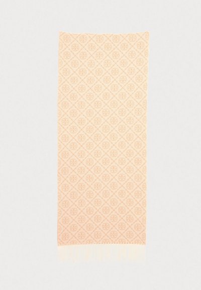 Peach patterned scarf with fringe, featuring a repetitive geometric design and subtle texture, made of soft fabric.