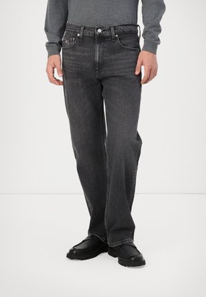 Jeans negri din denim cu un design drept, având închidere clasică cu nasture și fermoar, stil cu cinci buzunare și o decolorare subtilă.