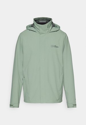 Világos zöld vízálló dzseki magas gallérral, cipzáras elülső résszel, állítható kapucnival és oldalsó zsebekkel. Simább, tartós anyagból készült.