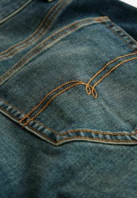 Next MOTION FLEX STRETCH - Vaqueros slim fit - vintage blue tint